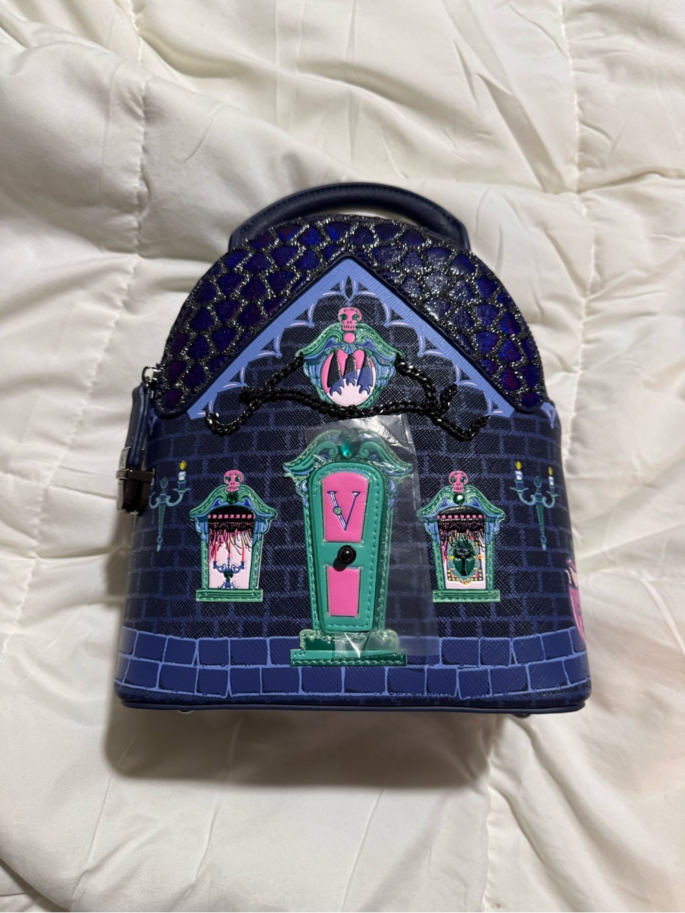 Navy Mini Backpack with Teal & Pink Decorative Doorway Accent
